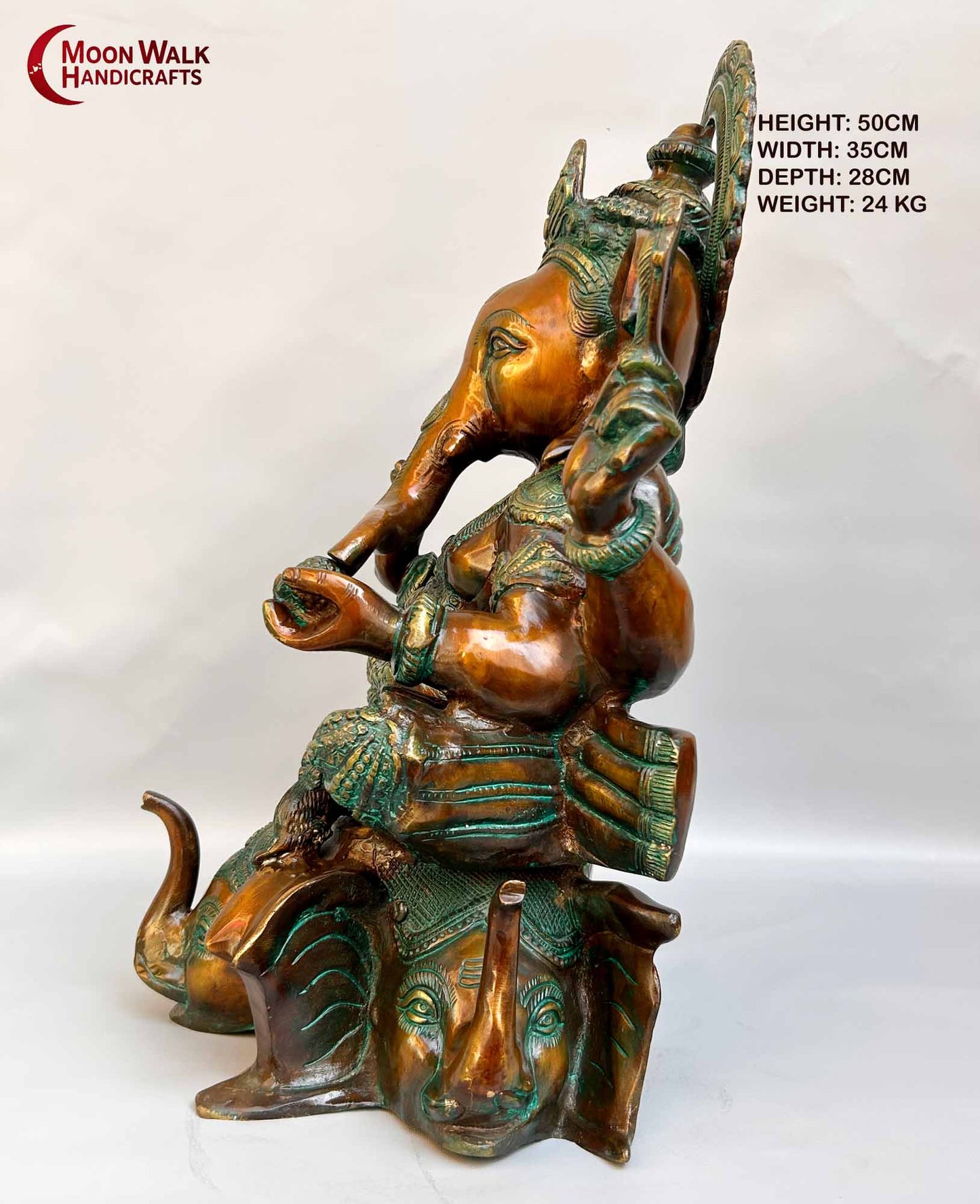 Rustic Brass Ganesh Statue seated on base with 3 Elephant Heads with trunks.