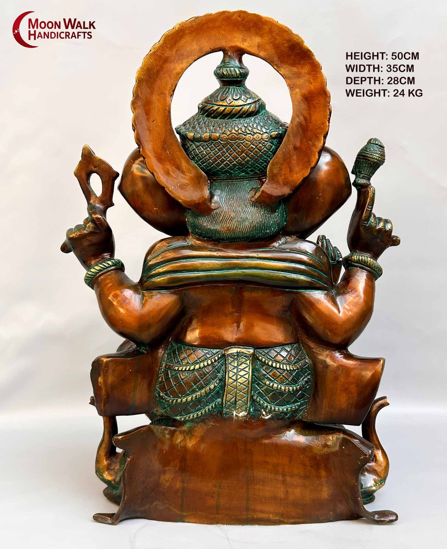 Rustic Brass Ganesh Statue seated on base with 3 Elephant Heads with trunks.