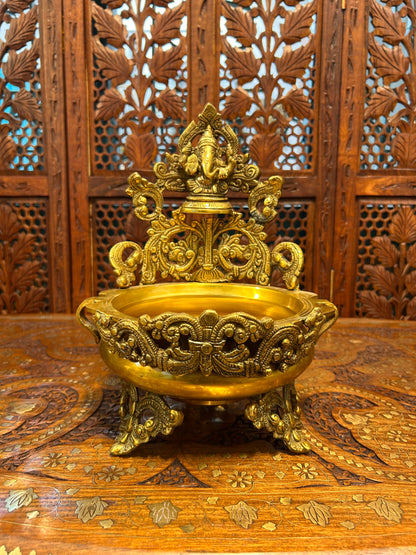 Exquisite brass Ganesha urli bowl with intricate carvings, ideal for home decor, pooja, festivals, or gifting, adding elegance and divine